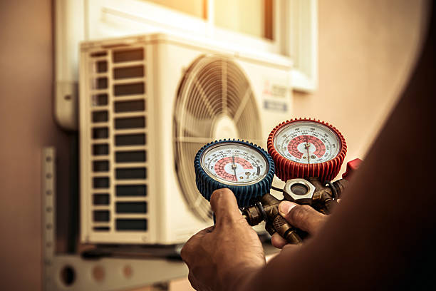 Professional Air Conditioning Service technician working in Rockville, IN